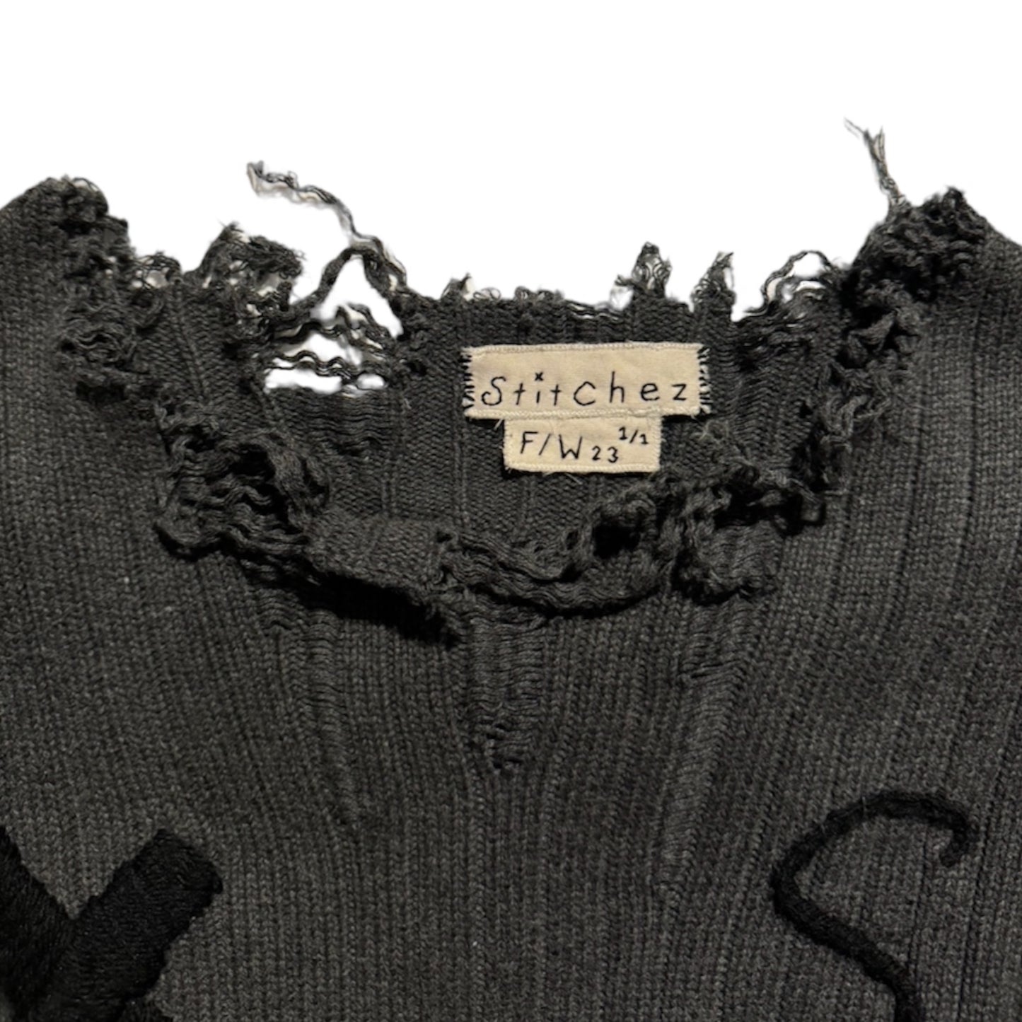1/1 “Lost & Found” Knit Sweater