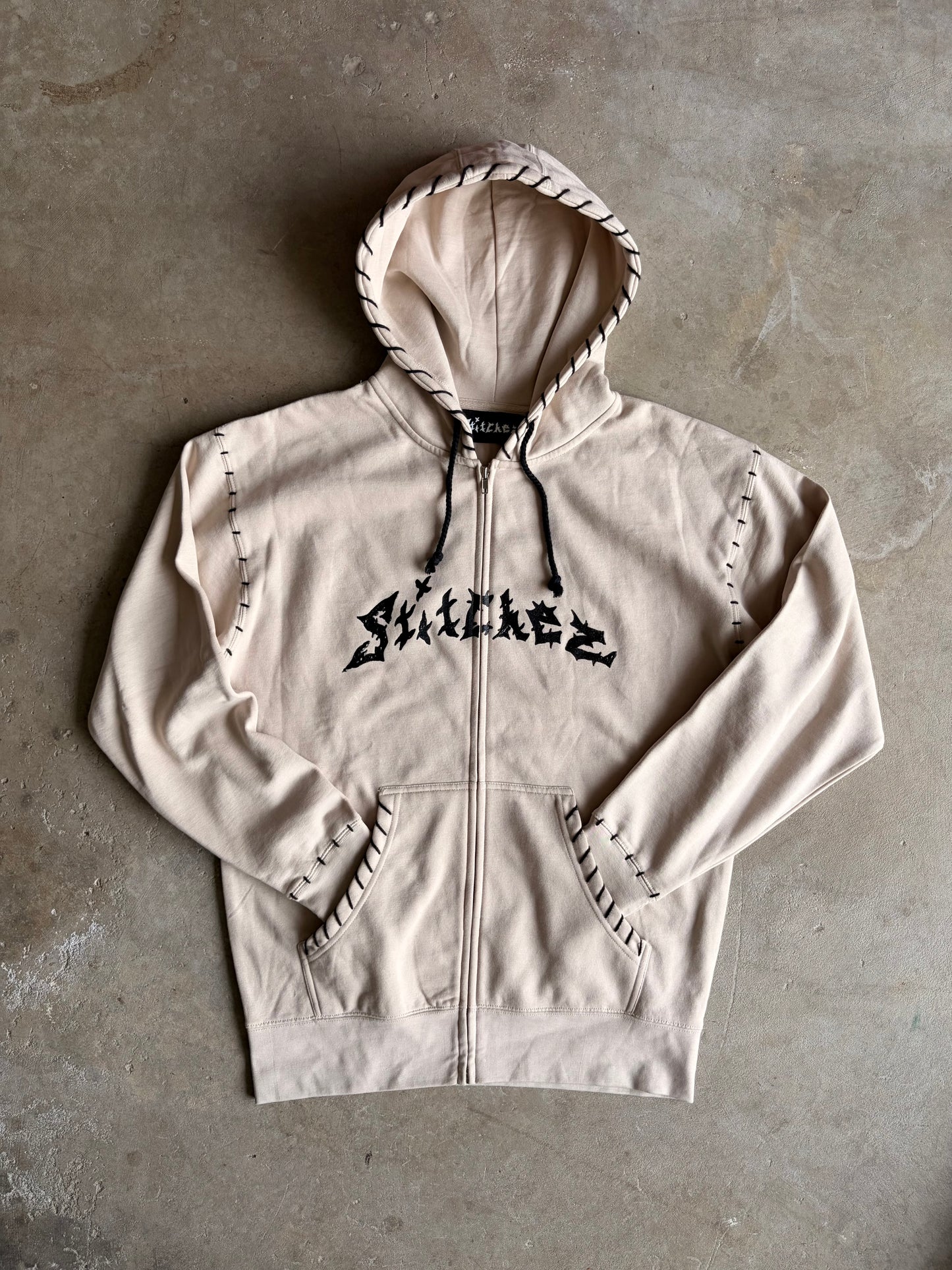 STITCHED ZIP-UPS