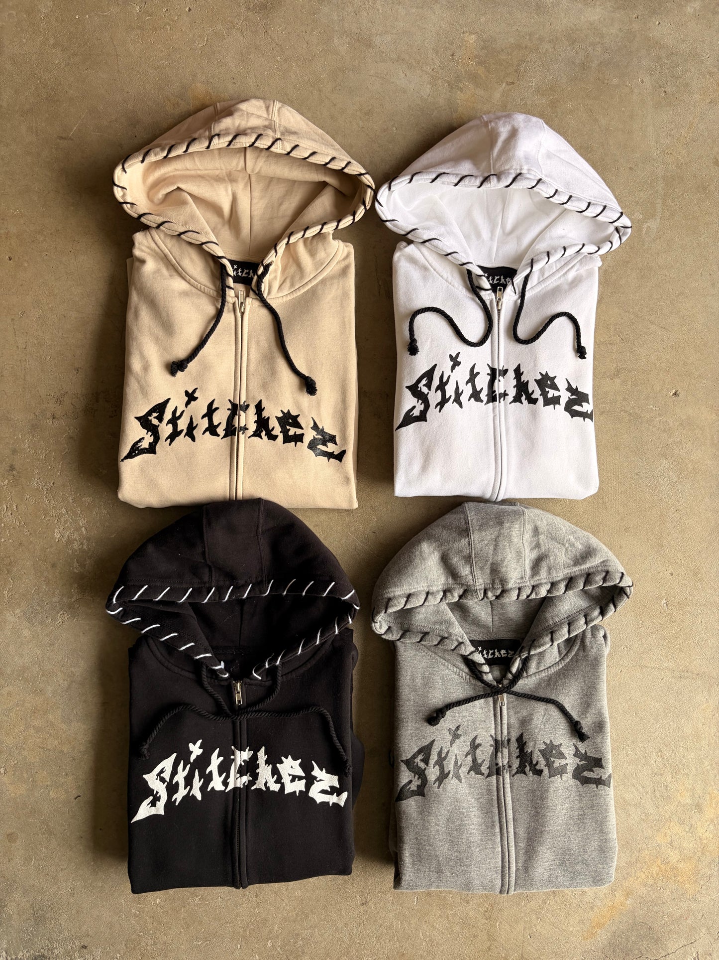 STITCHED ZIP-UPS