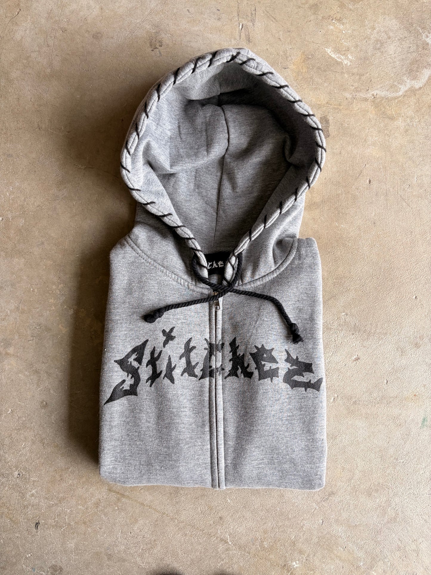 STITCHED ZIP-UPS