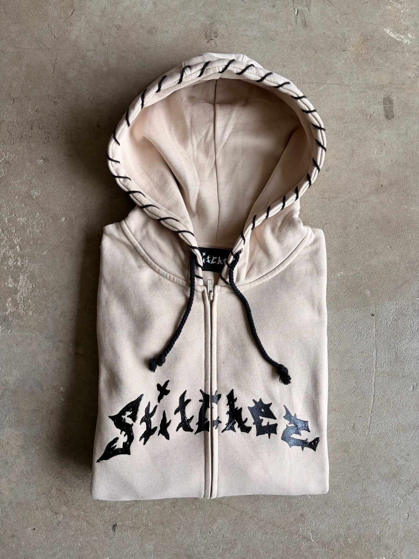 STITCHED ZIP-UPS