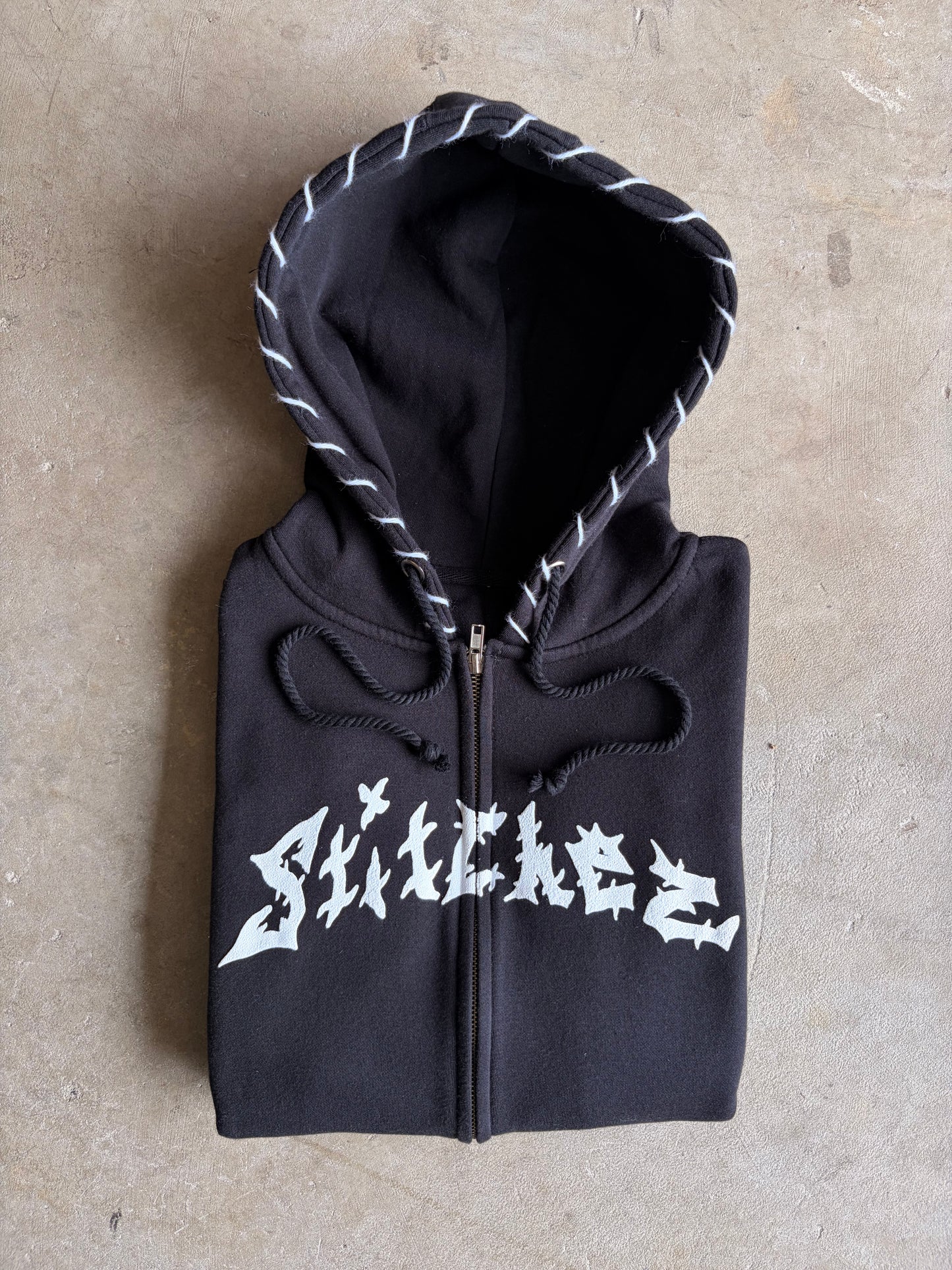STITCHED ZIP-UPS
