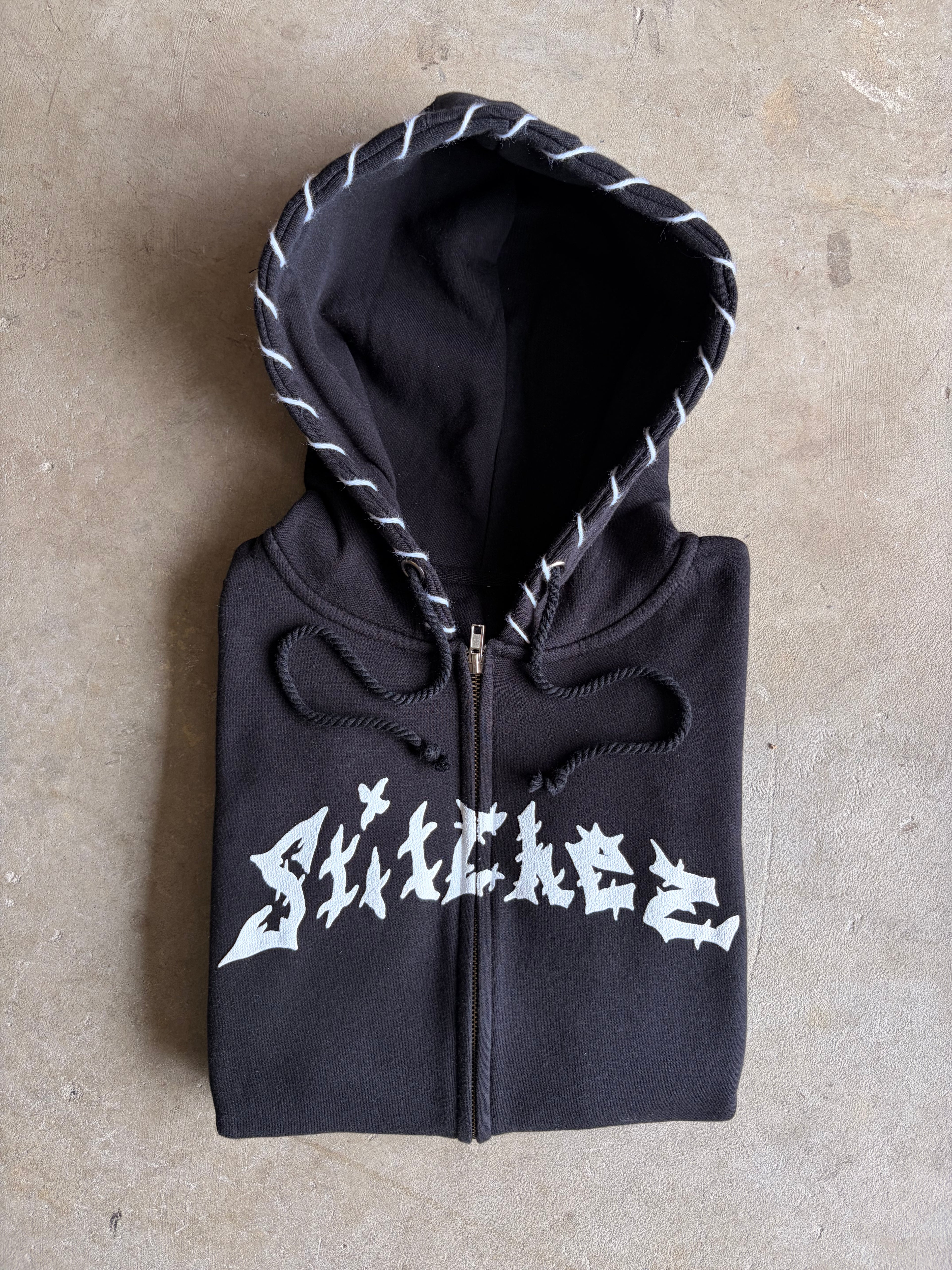 STITCHED ZIP-UPS