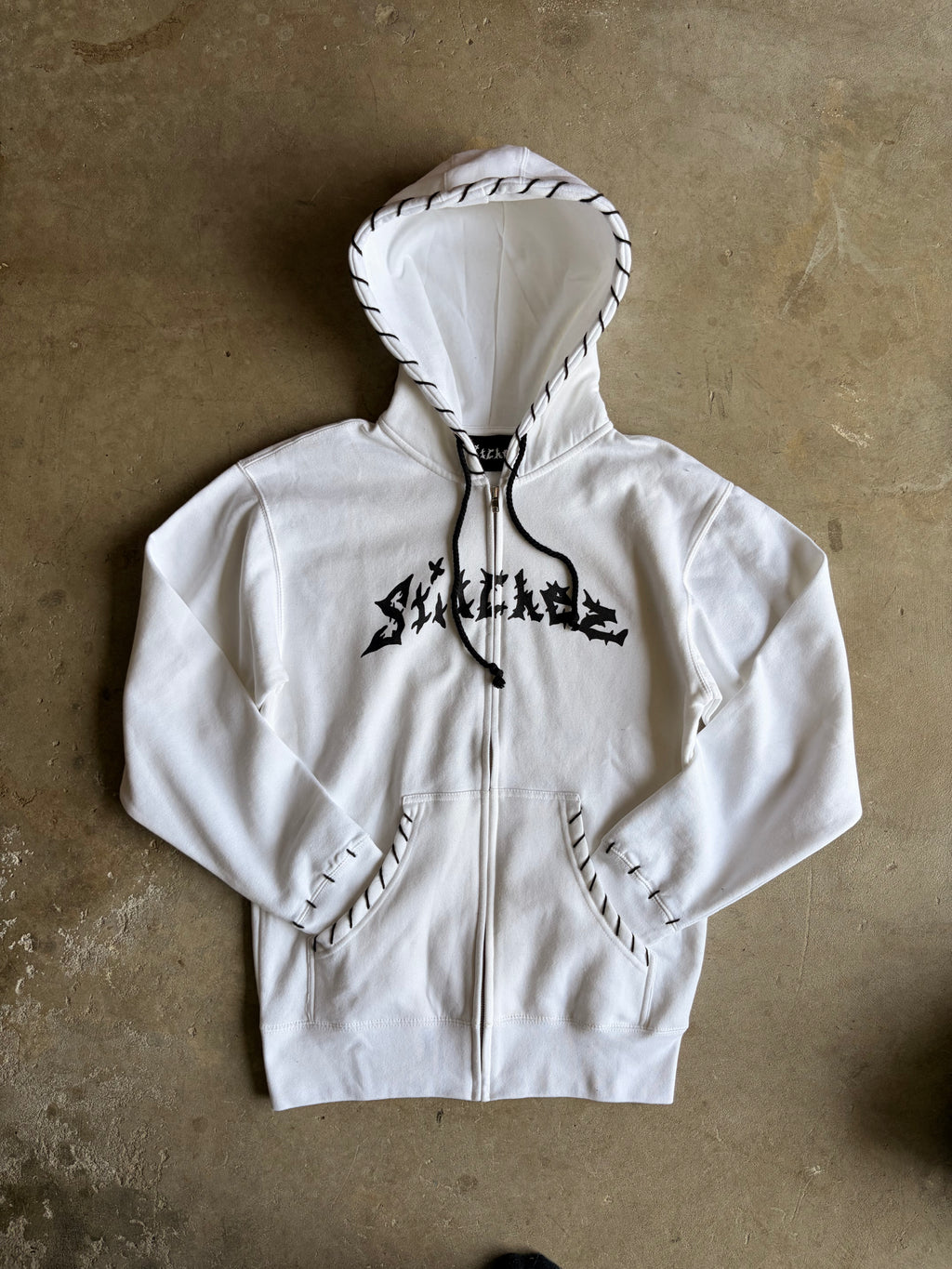 STITCHED ZIP-UPS