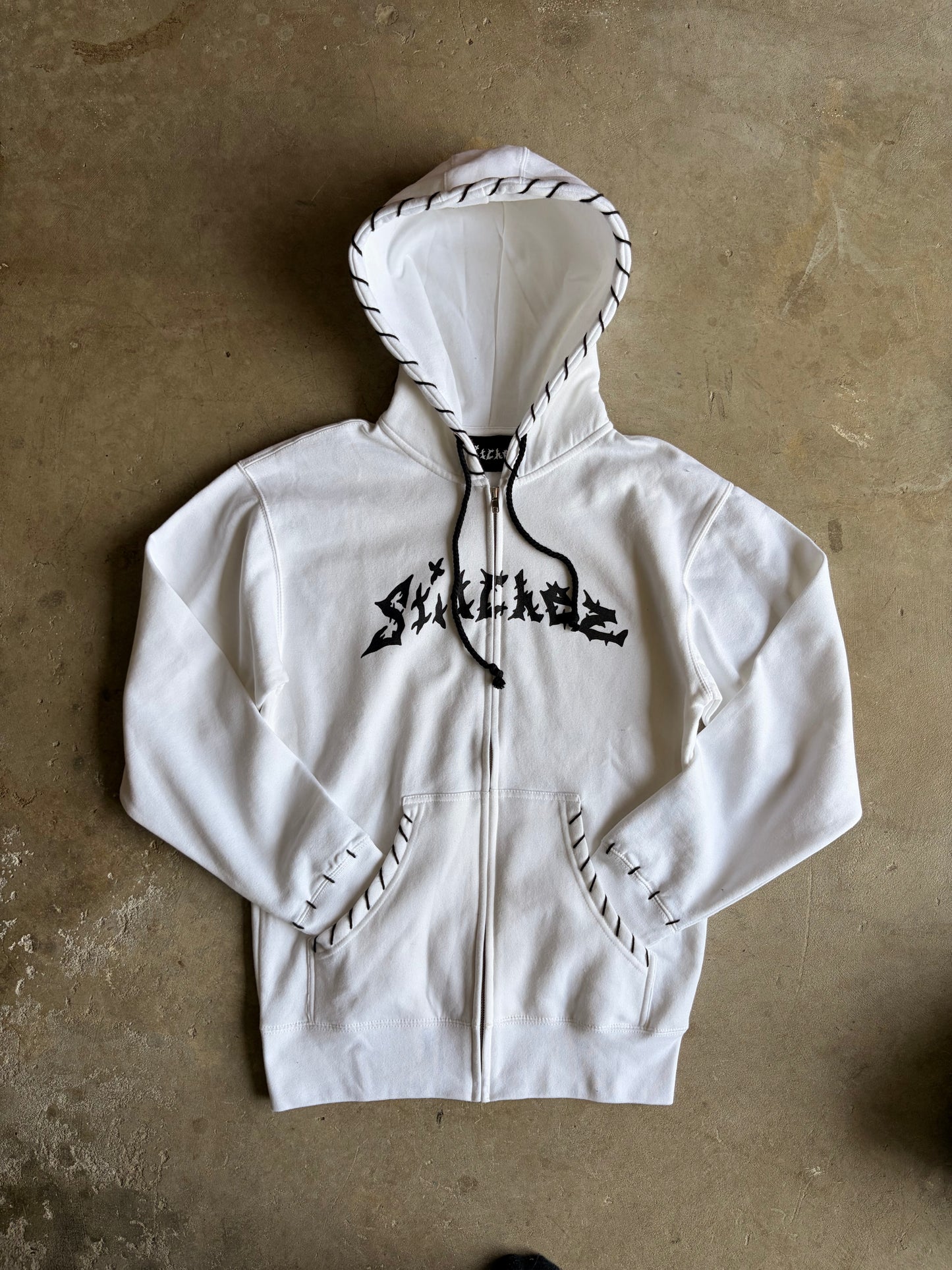 STITCHED ZIP-UPS