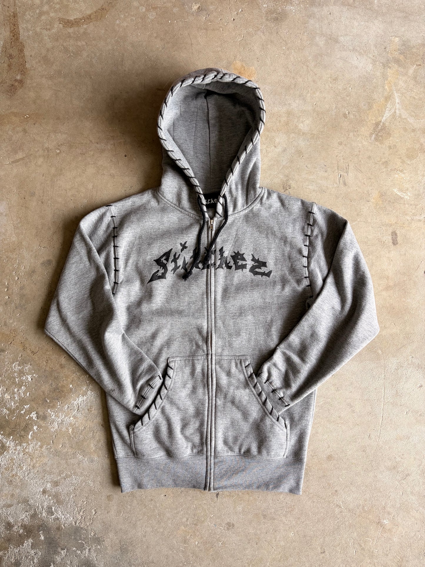 STITCHED ZIP-UPS