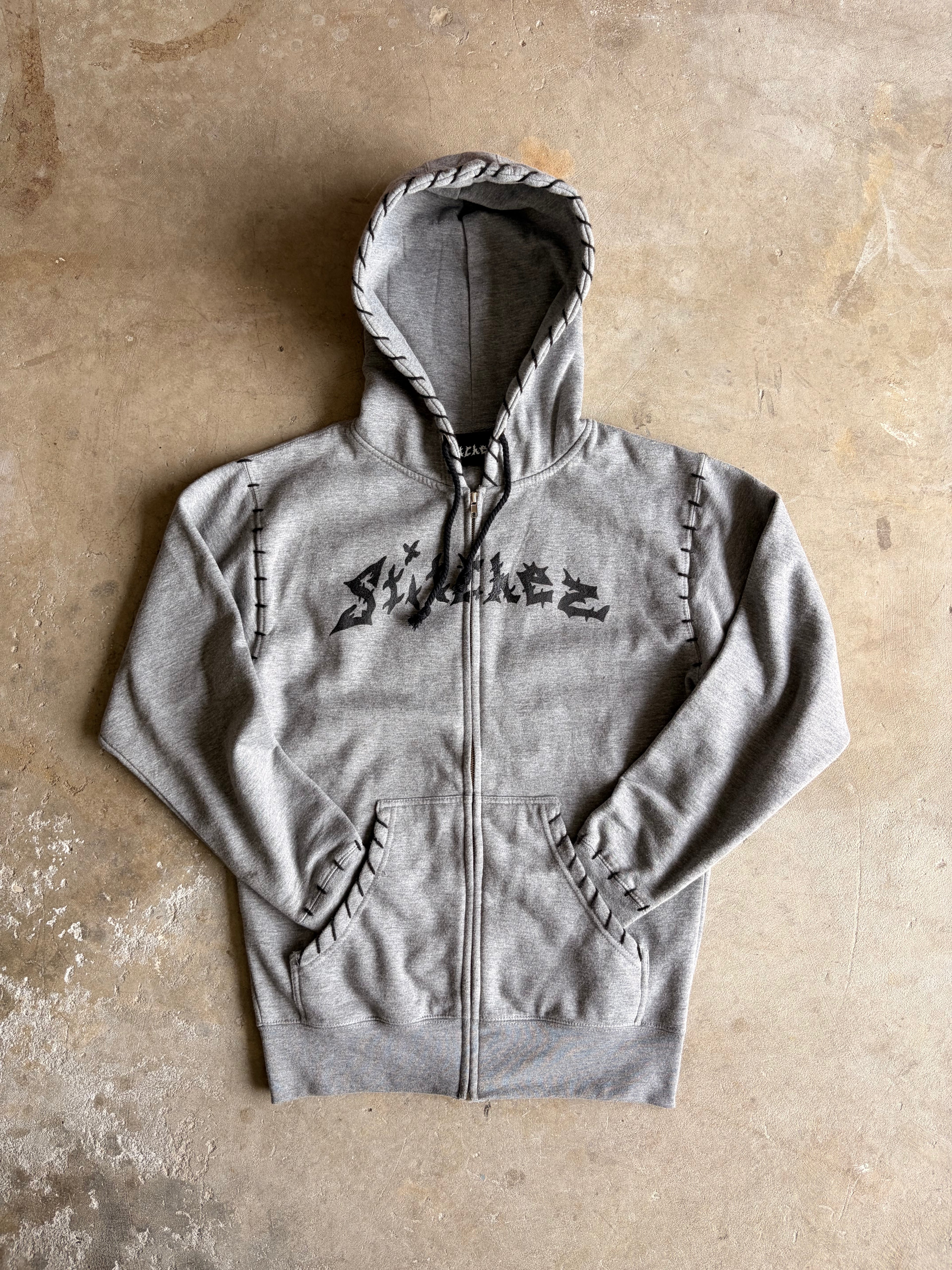 STITCHED ZIP-UPS